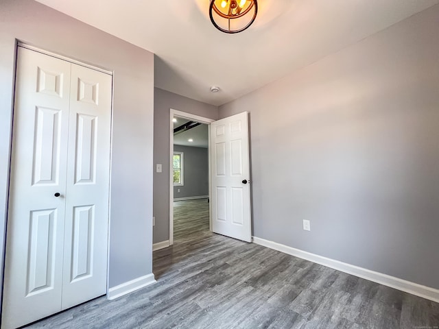 45 Cedar Ave, Wolcott, CT 06716 - unfurnished bedroom with wood finished floors and a closet