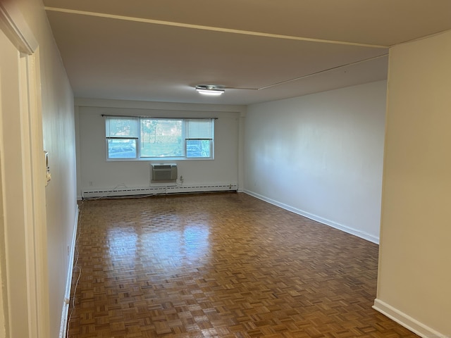 25 Cartright St Unit 1E, Bridgeport, CT 06604 - empty room featuring a baseboard radiator and an AC wall unit