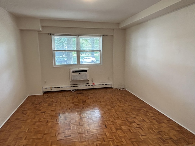 25 Cartright St Unit 1E, Bridgeport, CT 06604 - spare room with a baseboard heating unit and a wall mounted air conditioner