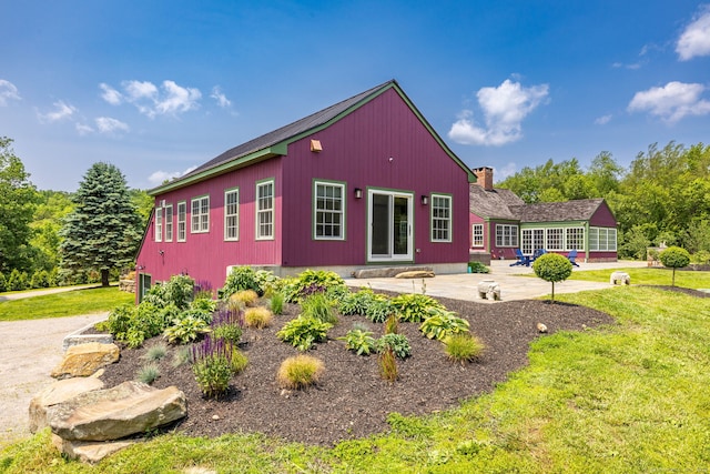 93 Northfield Rd, Litchfield, CT 06759 - rear view of property with a yard, a patio, and a chimney