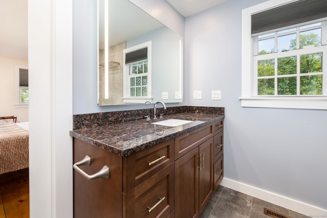 93 Northfield Rd, Litchfield, CT 06759 - ensuite bathroom featuring vanity and baseboards