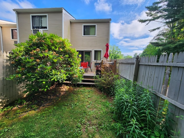 560 Yale Ave Unit 8, Meriden, CT 06450 - rear view of house with a wooden deck and a fenced backyard
