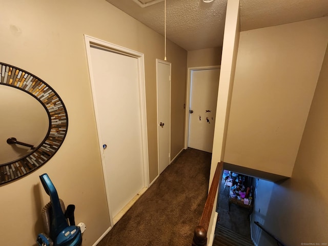 560 Yale Ave Unit 8, Meriden, CT 06450 - corridor featuring carpet floors, a textured ceiling, and attic access