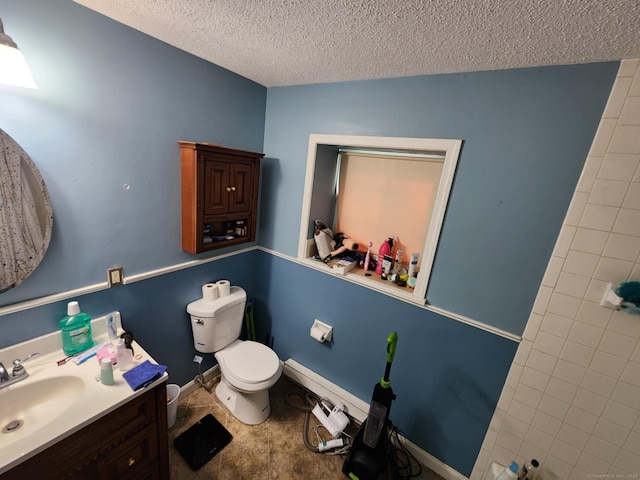 560 Yale Ave Unit 8, Meriden, CT 06450 - bathroom featuring a textured ceiling, vanity, and a shower