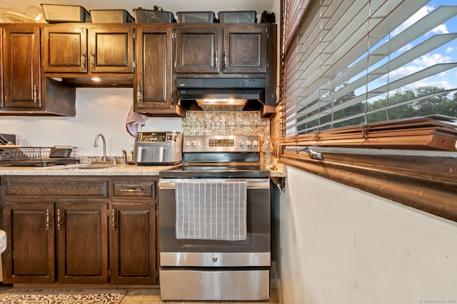 113E Country Squire Dr Unit 113E, Cromwell, CT 06416 - kitchen featuring stainless steel electric stove, under cabinet range hood, decorative backsplash, and dark brown cabinetry