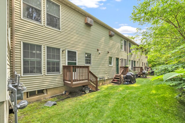 20 Oakland Ave Apt 3B, Danbury, CT 06810 - rear view of property featuring a yard and a wall mounted air conditioner