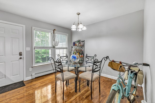 20 Oakland Ave Apt 3B, Danbury, CT 06810 - dining space with a baseboard radiator, a chandelier, and wood finished floors