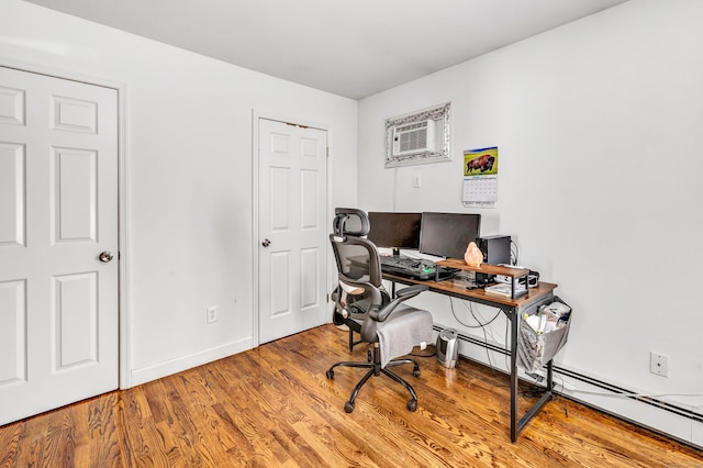 20 Oakland Ave Apt 3B, Danbury, CT 06810 - office area with a wall unit AC and wood finished floors