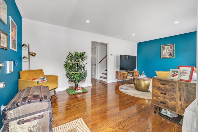 20 Oakland Ave Apt 3B, Danbury, CT 06810 - living area featuring wood finished floors, stairway, and recessed lighting