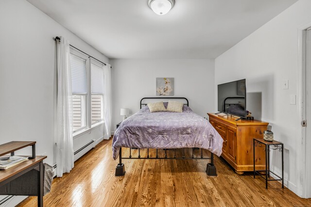 20 Oakland Ave Apt 3B, Danbury, CT 06810 - bedroom with a baseboard radiator and wood finished floors