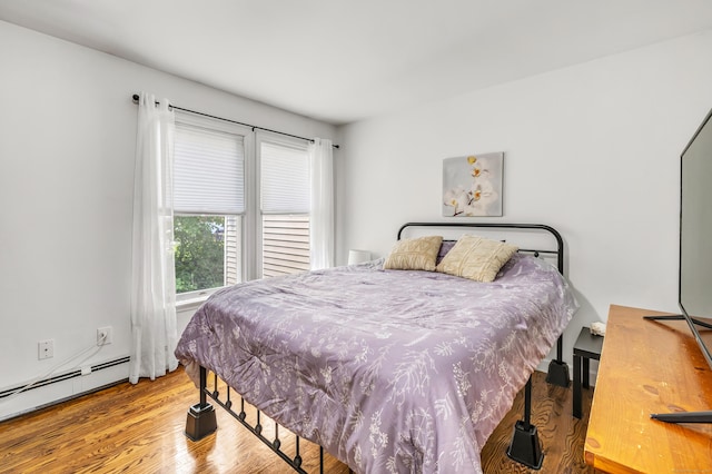 20 Oakland Ave Apt 3B, Danbury, CT 06810 - bedroom with a baseboard radiator and wood finished floors