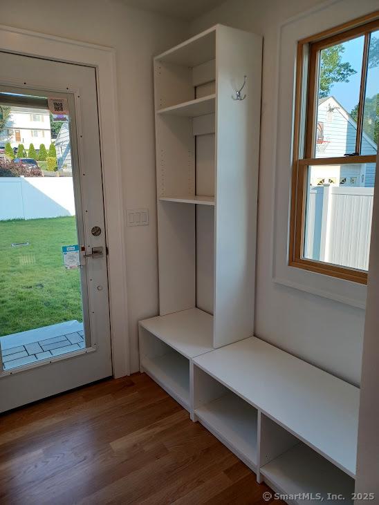 105 Houston Ter, Stamford, CT 06902 - mudroom featuring healthy amount of natural light and wood finished floors