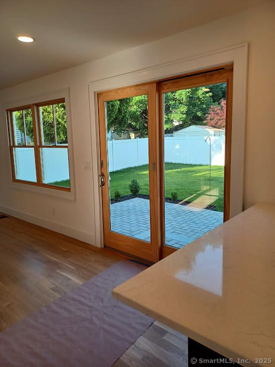 105 Houston Ter, Stamford, CT 06902 - entryway featuring wood finished floors and recessed lighting