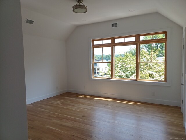 105 Houston Ter, Stamford, CT 06902 - bonus room with lofted ceiling, plenty of natural light, and wood finished floors