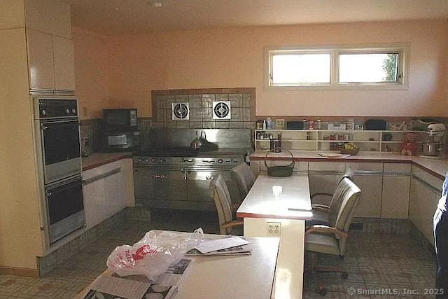 7 Hart Rd, Guilford, CT 06437 - kitchen featuring double oven and stove