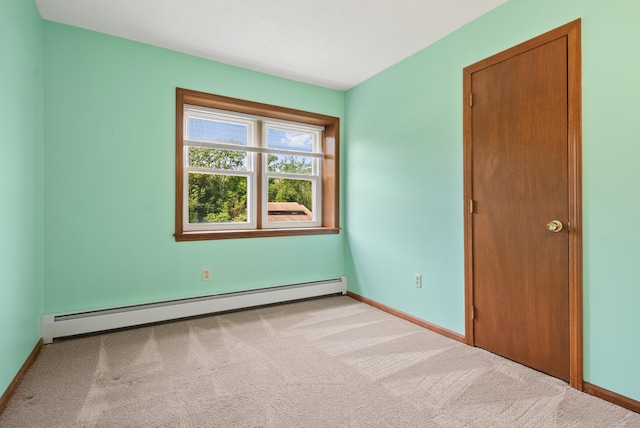 84 Bourbon St, South Windsor, CT 06074 - unfurnished bedroom with a baseboard heating unit and carpet floors