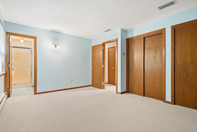 84 Bourbon St, South Windsor, CT 06074 - unfurnished bedroom with two closets and carpet flooring