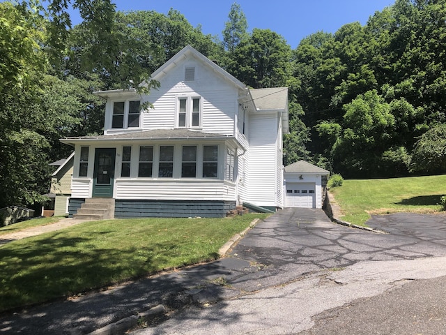 38 Upland Rd, Winchester, CT 06098 - view of front facade with entry steps, an outdoor structure, a garage, a front yard, and driveway
