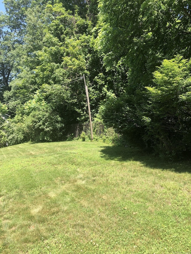 38 Upland Rd, Winchester, CT 06098 - view of yard featuring a wooded view