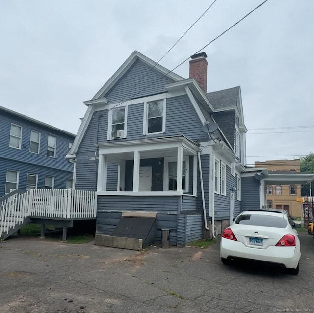 453 Burnside Ave, East Hartford, CT 06108 - view of front of house featuring a chimney