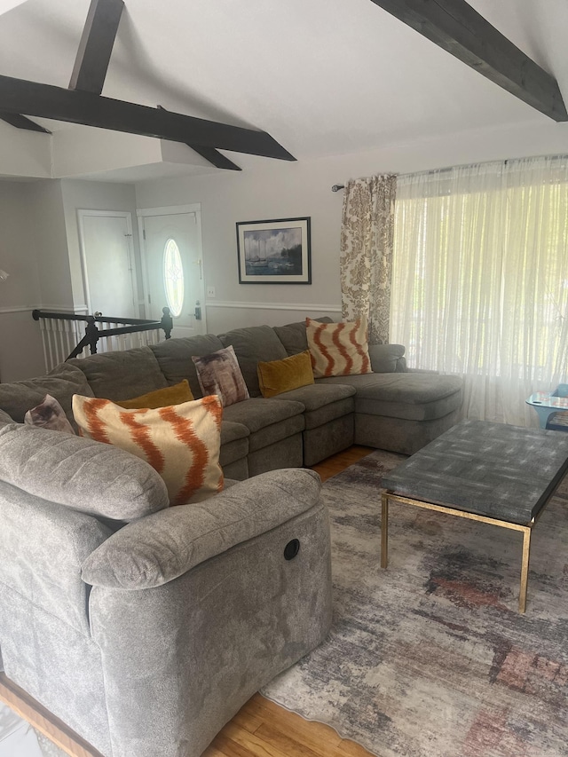 62 Haddad Rd, Waterbury, CT 06708 - living area with wood finished floors, healthy amount of natural light, and a ceiling fan