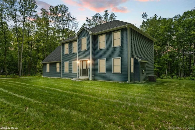 379 Tripp Hollow Rd, Brooklyn, CT 06234 - back of house at dusk with a yard