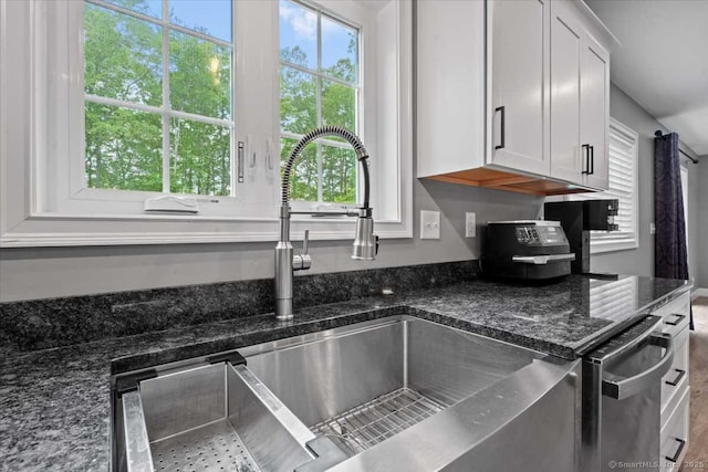 379 Tripp Hollow Rd, Brooklyn, CT 06234 - kitchen with white cabinets, dark stone countertops, and dishwasher