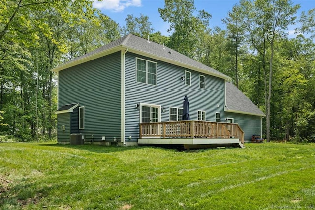379 Tripp Hollow Rd, Brooklyn, CT 06234 - rear view of property featuring a wooden deck, a yard, and a shingled roof