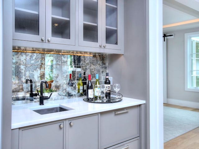 2 Webb Rd, Westport, CT 06880 - indoor bar with decorative backsplash and wood finished floors