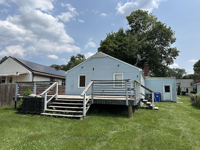 70 Cedar Ridge Rd, Newington, CT 06111 - rear view of house with a wooden deck