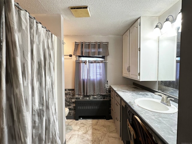 70 Cedar Ridge Rd, Newington, CT 06111 - bathroom featuring vanity, a textured ceiling, curtained shower, and marble finish floors