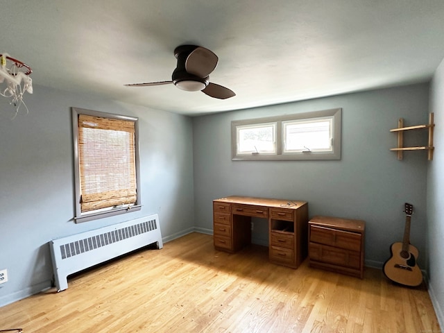 70 Cedar Ridge Rd, Newington, CT 06111 - unfurnished office featuring radiator, ceiling fan, and light wood-style floors