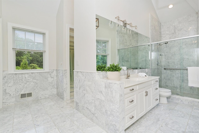 2787 Redding Rd, Fairfield, CT 06824 - bathroom with vanity, a stall shower, marble finish floors, and tile walls