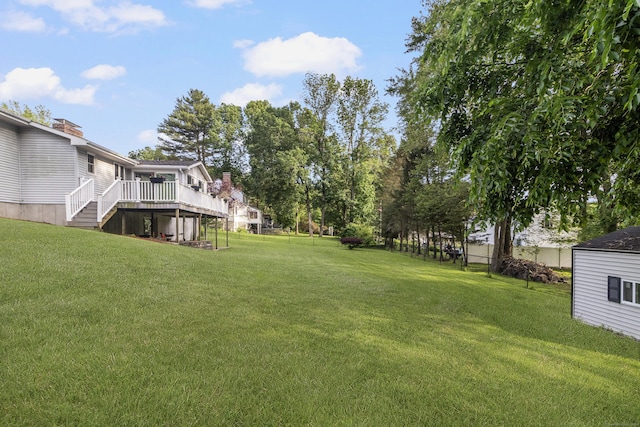 29 Birchwood Dr, Killingly, CT 06241 - view of green lawn featuring a deck and stairway