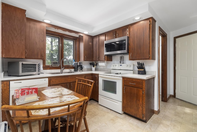 29 Birchwood Dr, Killingly, CT 06241 - kitchen featuring white appliances, light countertops, and recessed lighting