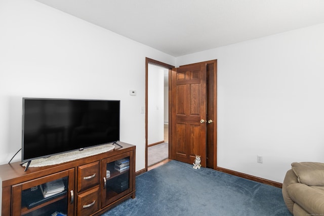 29 Birchwood Dr, Killingly, CT 06241 - living room featuring dark colored carpet and baseboards