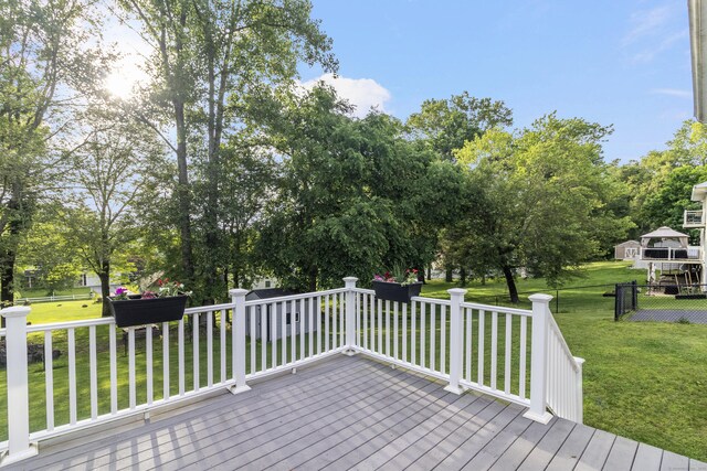 29 Birchwood Dr, Killingly, CT 06241 - deck featuring a lawn and view of wooded area