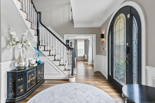 10 Amato Dr, Wethersfield, CT 06109 - entryway with wainscoting, stairway, wood finished floors, and crown molding