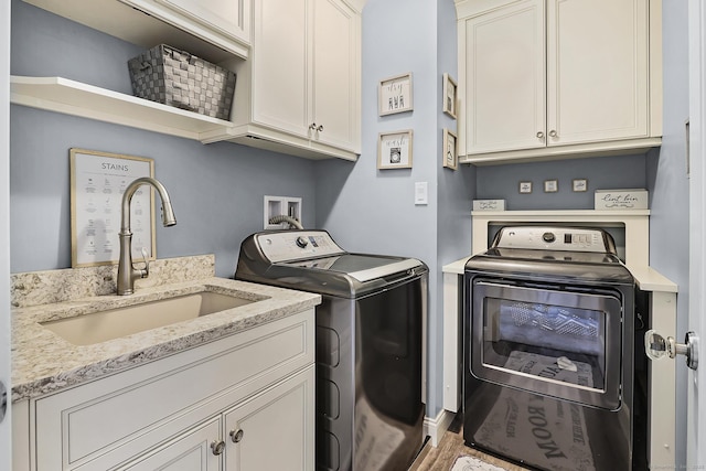 10 Amato Dr, Wethersfield, CT 06109 - laundry room with washing machine and clothes dryer and cabinet space