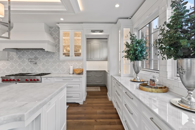 10 Amato Dr, Wethersfield, CT 06109 - kitchen featuring dark wood-style flooring, stainless steel gas stovetop, recessed lighting, tasteful backsplash, and white cabinetry