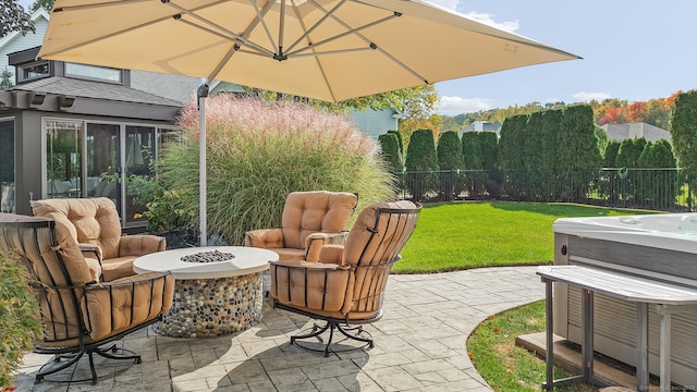 10 Amato Dr, Wethersfield, CT 06109 - view of patio featuring a hot tub and an outdoor living space with a fire pit