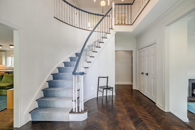 226 Nod Hill Rd, Wilton, CT 06897 - stairway featuring crown molding and a high ceiling