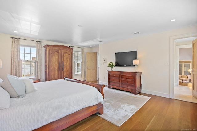 216 Hillspoint Rd, Westport, CT 06880 - bedroom featuring wood finished floors and recessed lighting