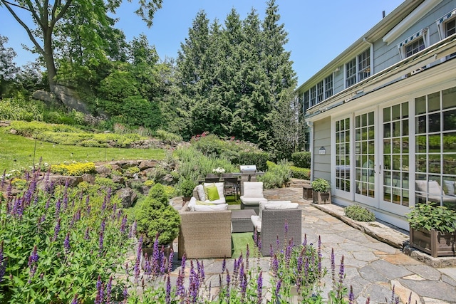 216 Hillspoint Rd, Westport, CT 06880 - view of patio featuring french doors and an outdoor living space