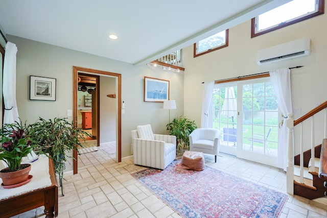 15 Harris Rd, Salem, CT 06420 - living area featuring a wall mounted AC, stairs, healthy amount of natural light, and recessed lighting