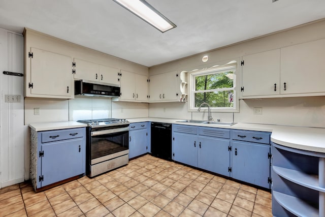 98 Torrington Ave, Canton, CT 06019 - kitchen with black appliances, blue cabinets, light countertops, open shelves, and ventilation hood
