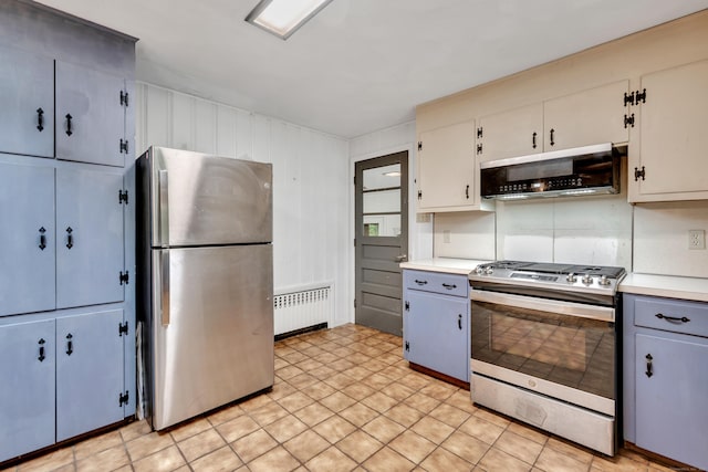 98 Torrington Ave, Canton, CT 06019 - kitchen with stainless steel appliances, radiator heating unit, light countertops, and gray cabinets