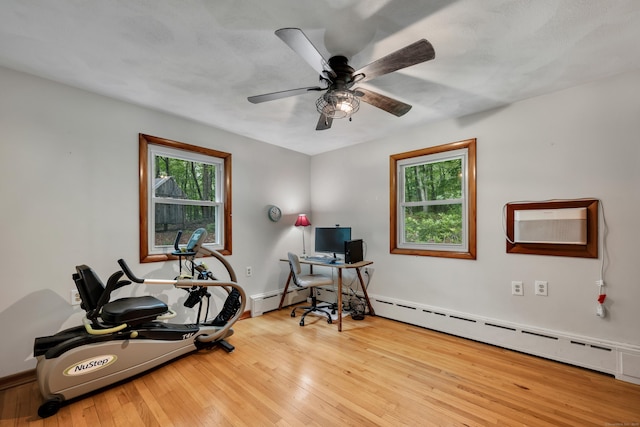 98 Torrington Ave, Canton, CT 06019 - home office featuring wood-type flooring, a ceiling fan, and a baseboard radiator