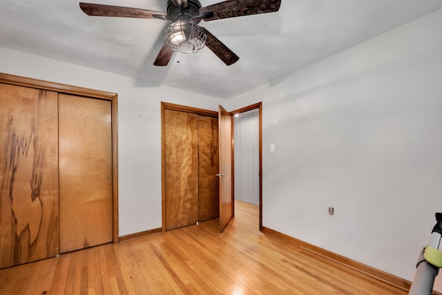 98 Torrington Ave, Canton, CT 06019 - unfurnished bedroom featuring two closets, light wood-type flooring, and ceiling fan