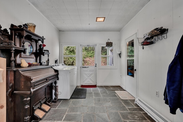 98 Torrington Ave, Canton, CT 06019 - laundry room featuring separate washer and dryer, a baseboard heating unit, and stone tile flooring